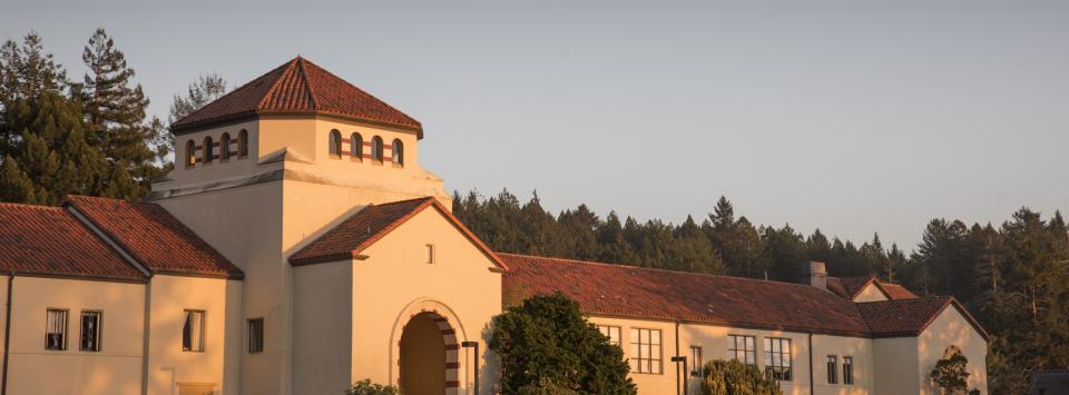 a building - founders hall at dusk